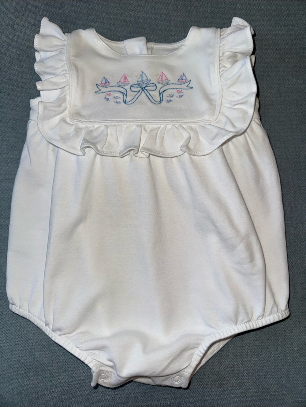 Lila and Hayes White Ruffle Sailboat Embroidered Baby One-Piece
